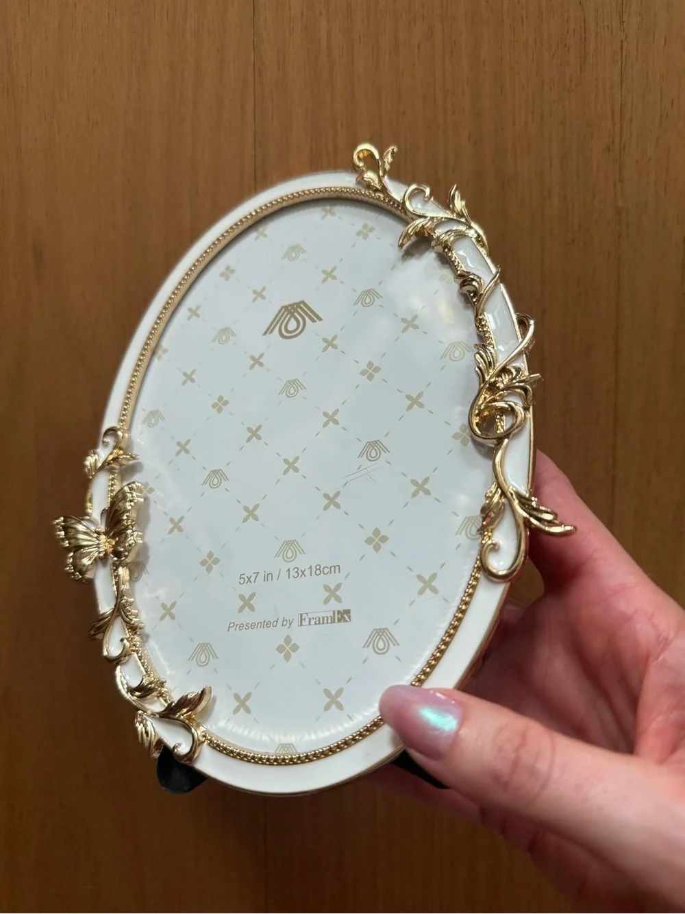 New 5 x 7 white oval picture frame with gold butterfly and leaf accents